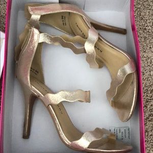 Sparkly gold high heels